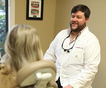 Dr. Langston speaking with a patient
