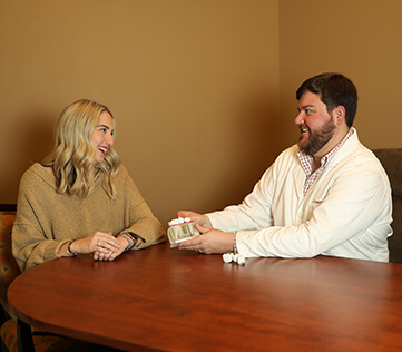 Dr. Langston speaking with a patient