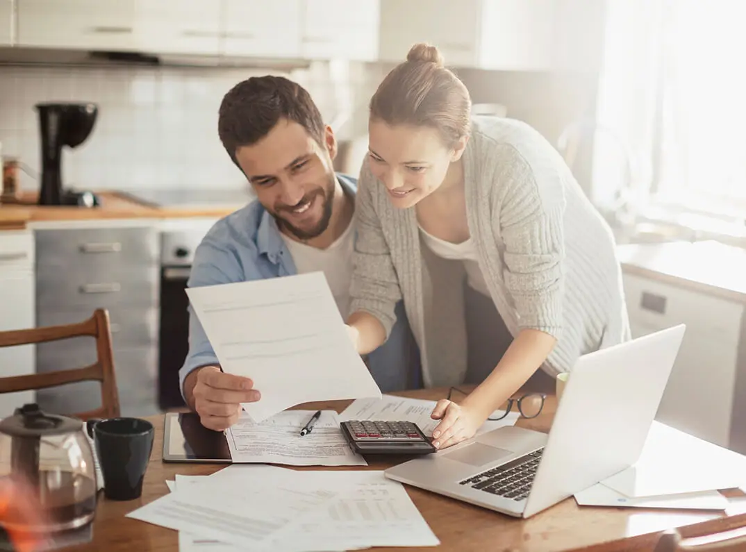 couple looking over paperwork together